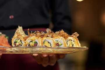 Close-up photo of appetizing set of sushi on plate