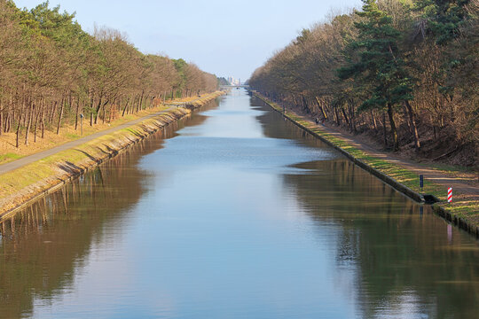 View of the canal Bocholt-Herentals with distant hikers