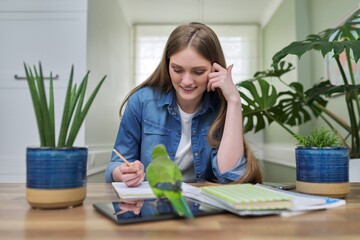 Young female university student studying online using video communication © Valerii Honcharuk