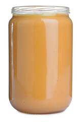 Delicious peanut butter in glass jar isolated on white