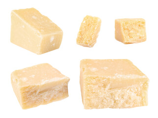 Set with pieces of delicious parmesan cheese on white background
