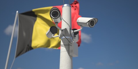 Naklejka na ściany i meble Security cameras near flag of Belgium, 3d rendering