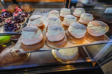Nynashamn, Sweden Swedish baked delicacies called semlor, semla, in a bakery window.