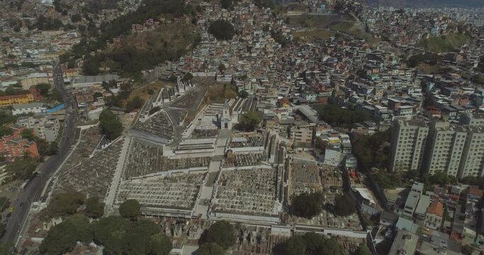 Aerial of the Catumbi Cemetery, Sao Francisco de Paula Cemetery in central Catumbi neighbourhood of Rio de Janeiro alongside a favela