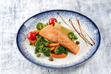 salmon steak with roasted vegetables