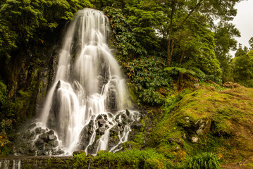 Wonderful waterfall at Azores travel destination, Sao Miguel island.