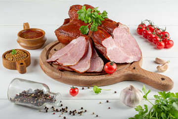 
smoked meat and sausages in assortment on the table