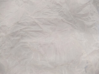 crumpled white paper texture and background closeup photo