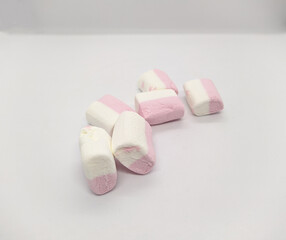 pink and white colors marshmallow on a white background