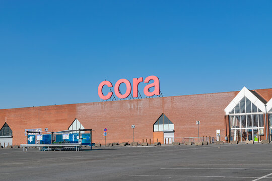 Villeneuve d'Ascq,FRANCE-February 28,2021:  View of Cora hypermarket,entrance and parking.Cora is a Belgian international supermarket chain. Cora was founded in 1974.