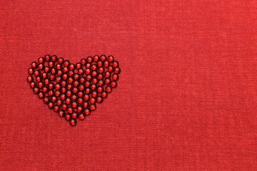 red heart on a red background