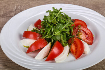 Traditional Italian Caprese salad with mozarela