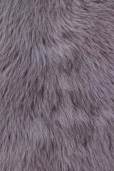 Background. Lamb pelt with long hair, gray. Vertical orientation, close-up.