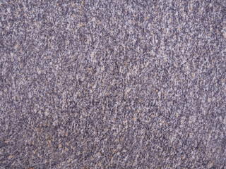 Polished granite slab texture. Stone pattern. Close-up.