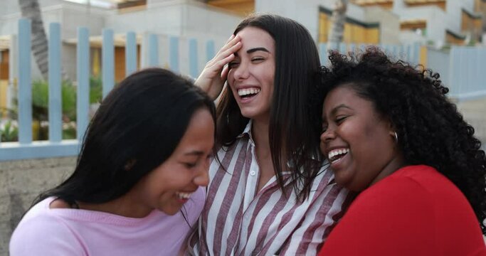 Happy latin girls enjoy time together outdoor in the city - Vacation, weekend, happiness and friendship concept