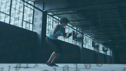 Binary coding data processing against african american woman performing jumping jack exercise - Powered by Adobe