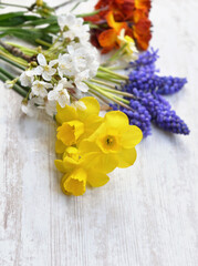pretty little bouquet of fresh flowers picked in the garden on white table