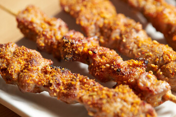 Grilled lamb skewers with seasoning 