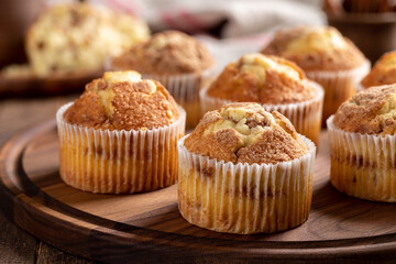 Cinnamon Muffins on a Wooden Platter