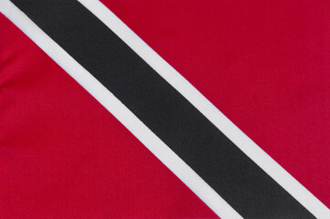 fabric of the national flag of the Republic of Trinidad and Tobago close-up