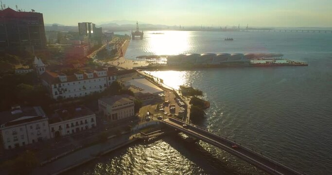 Rio de Janeiro sunset panorama of port area and Museum of Tomorrow with sun reflecting on water