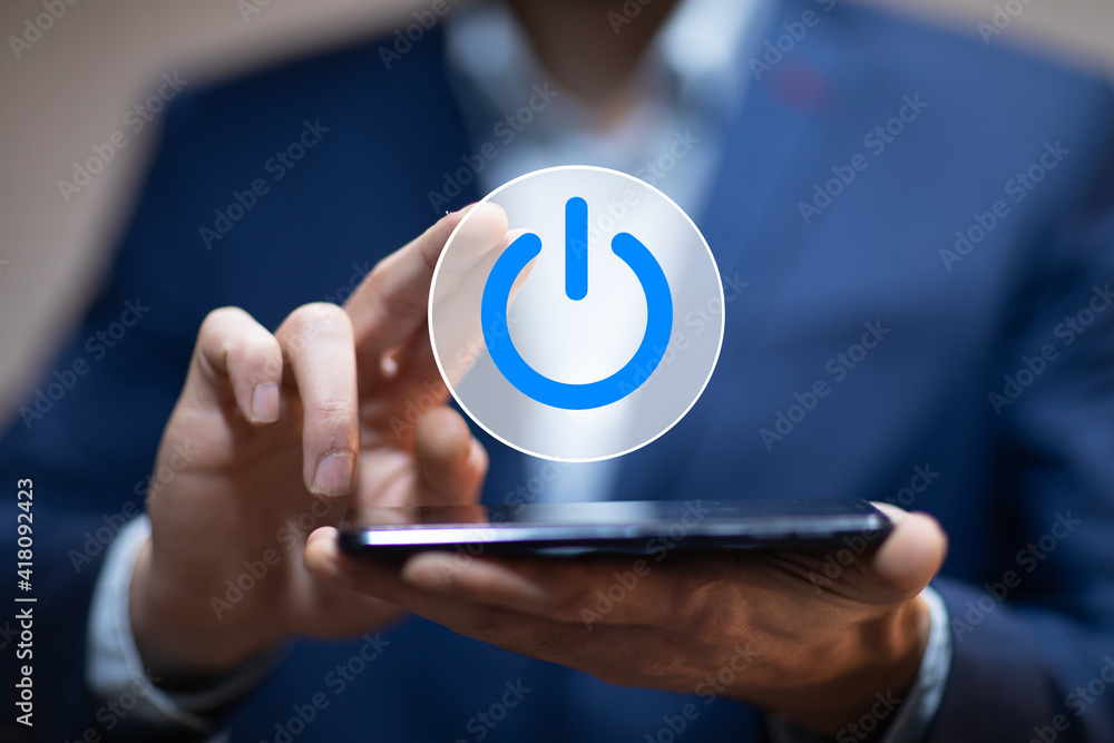 Poster man holding tablet with power button