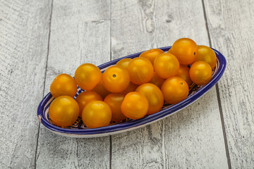 Fresh yellow cherry tomato heap