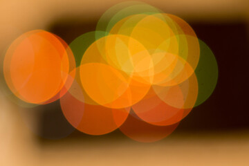 Blurred multicolored lights on a dark background.