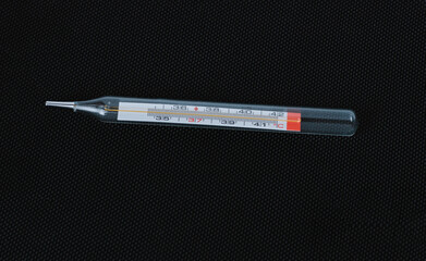thermometer on black