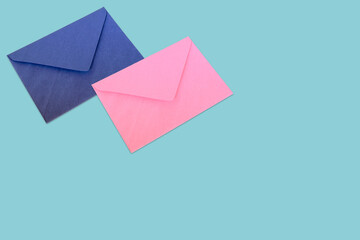 blue and pink envelopes on blue background
