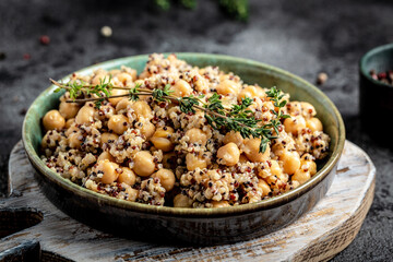 bowl of quinoa salad with chickpeas and thyme. Super food, Food recipe background. Close up