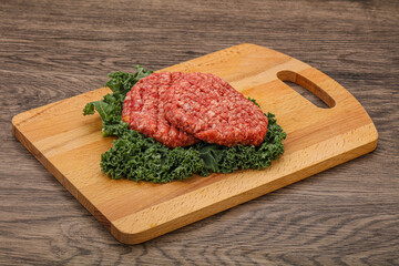 Raw beef burger cutlet for cooking