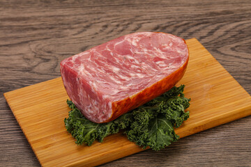 Beef ham piece over board