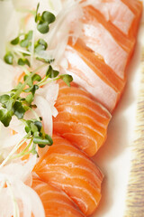 Salmon sushi with fresh vegetables

