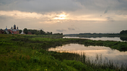 Monastery and river Daugava in the evening. Jekabpils, Latvia.