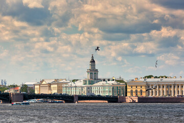 building of the Kunstkammer in St. Petersburg against the sky with clouds, Russia