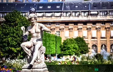 Statue fountain in the park by palace