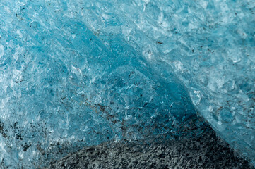 Blue and white glacier in cold beautiful Alaska