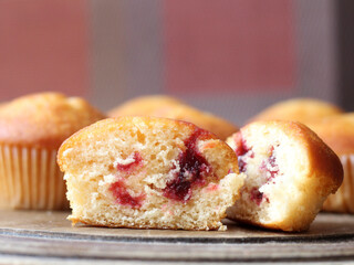 Delicious fresh muffins with berry filling