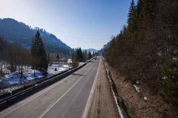 Aerial view on mountain road from drone in