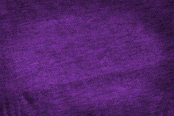 Texture of purple cotton fabric with shadows.