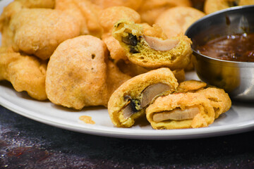 Mushroom bhaji snack. Battered mushrooms served with tamarind chutney