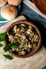 sliced mushrooms with garlic and parsley