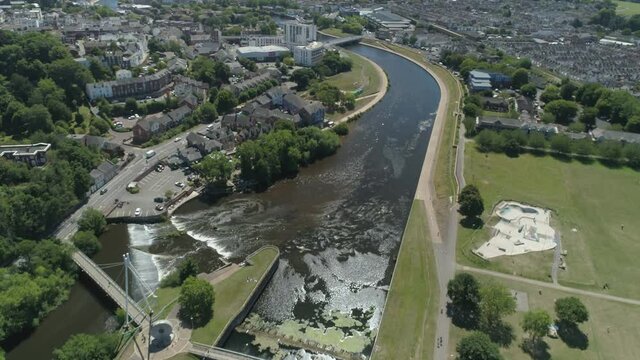 Aerial following the river exe convergence into the city centre