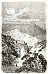 mountain path leading to a high mountain with top partial hided by clouds, Col du Perthus, France. Ancient grey tone etching style art by Dore, Magasin Pittoresque, 1838