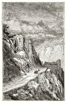 small horseback people walking among uphill path in Col du Perthus mountain, France. Stronghold ruins along the road. Ancient grey tone etching style art by Dore, Magasin Pittoresque, 1838
