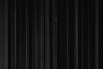 Black strip line metal sheet container wall texture for background.