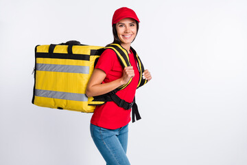 Profile side photo of young happy smiling lovely service girl with delivery backpack isolated on grey color background