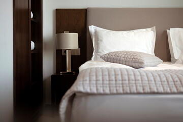 Room With King-size Bed, Pillows, Lamp And Blanket. Comfortable Bedroom Suite For Vacation Or Business Trip.