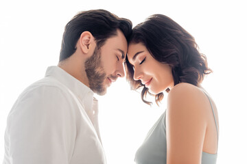 Side view of man standing with closed eyes near wife isolated on white